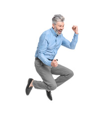 Mature businessman in stylish clothes jumping on white background