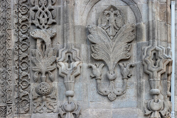 Fototapeta na wymiar Erzurum Double Minaret Madrasa Stone Intricate Carvings ,Embellishments.Dragon, tree of life, eagle