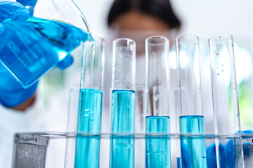 Chemical laboratory research with scientific tube and flask glassware equipment, science medicine liquid experiment test on Chemistry, Biotechnology, or Biology for business medicals development