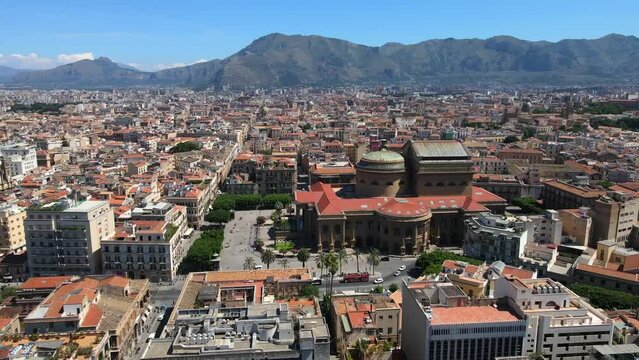 Aerial shot drone flies toward left side of Teatro Massimo in Palermo, Sicily, Italy