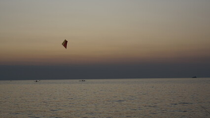 kite on the beach with a view of the sunset sky in Bali
