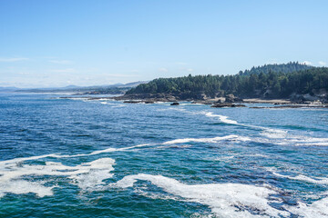 Beautiful Oregon coast. Pacific ocean, beach, cliffs, sky, water.