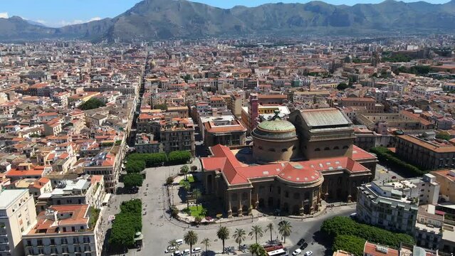 Aerial shot drone orbits to the left around Teatro Massimo in Palermo, Sicily, Italy