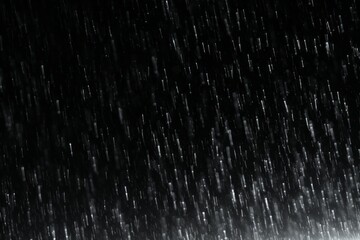Falling rain drops on a black background. Graphic resource for installation or blank for design. AI generated