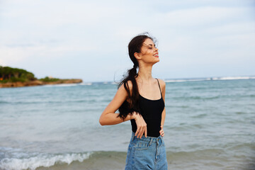 woman vacation sea sand lifestyle smile sunset summer ocean walking beach