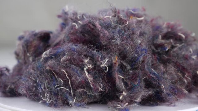 Textile recycling the reuse as well as reproduction of fibers from textile waste. Recycling fiber