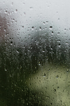 Rain drops on a window glass overlay texture 