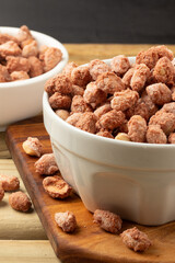 Focus on praline peanuts bowl.