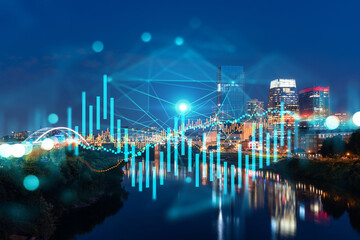Skyscrapers Cityscape Downtown View, Nashville Skyline Buildings. Beautiful Real Estate. Night time. Forex Financial graph and chart hologram. Business education concept.