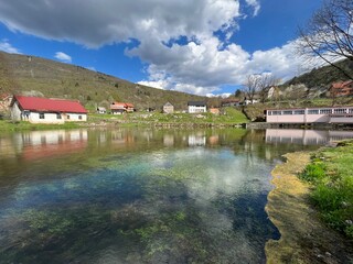 Fototapeta premium The springs of the Gacka river - Tonkovic spring, Croatia (Izvori rijeke Gacke ili Vrila Gacke - Tonkovićevo vrilo ili Tonković vrilo, Sinac - Lika, Hrvatska)
