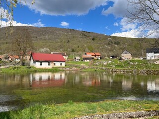 Fototapeta premium The springs of the Gacka river - Tonkovic spring, Croatia (Izvori rijeke Gacke ili Vrila Gacke - Tonkovićevo vrilo ili Tonković vrilo, Sinac - Lika, Hrvatska)