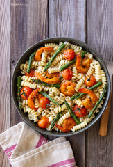 Pasta with shrimp, asparagus and tomatoes. Healthy eating. Diet.