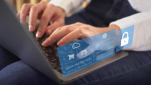 Woman typing on her laptop in the office environment and doing online payment with digital wallet and secure login, safety Data protection, VPN, Internet cyber security, Cyber crime protection