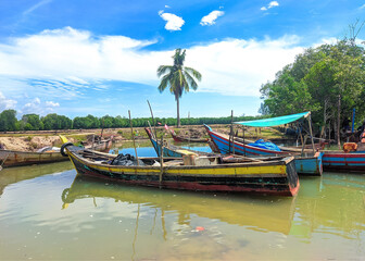 Naklejka na ściany i meble fishing boat on the river, traditional boat to catch fish