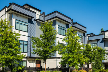 New Modern Apartment Buildings in Vancouver BC. Canadian modern residential architecture on sunny summer day