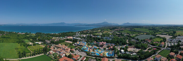 Amusement park, attractions on Lake Garda in Italy, aerial view. Aerial panorama of the popular Amusement Park on Lake Garda aerial view. Attractions in Italy.
