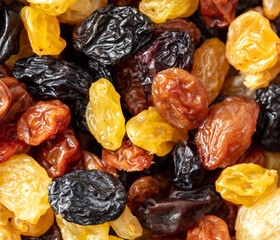 Multicolored raisins as a background. Macro