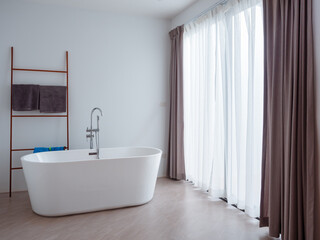 Fototapeta na wymiar Bathtub white ceramic interior luxury in bathroom