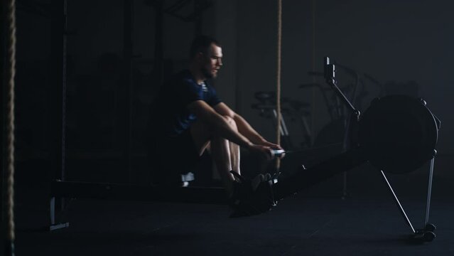 Workout With Rowing Machine In Fitness Center, Aerobic Workout For Good Health, Rehabilitation