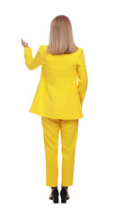 Businesswoman in suit standing on white background, back view
