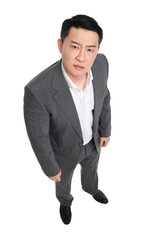 Angry businessman in suit posing on white background, above view