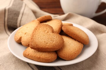 Heart shaped Danish butter cookies on table, closeup