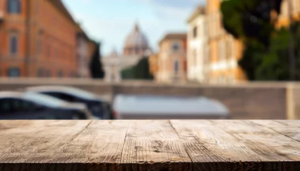Fototapeten The empty wooden table top with blur background of Rome. Exuberant image. © Uuganbayar