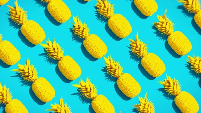 Pineapples on a vivid colors background ideal for summer footage