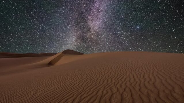 Amazing views of the desert under the night starry sky. Timelapse.