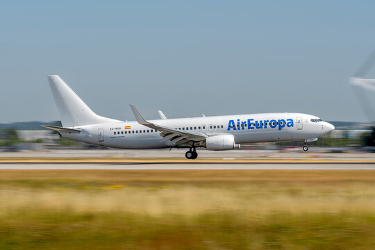 Air Europa Boeing 737-8AS with the aircraft registration EC-NVQ .during landing to the southern runway 08R gof the Munich Airport MUC EDDM
