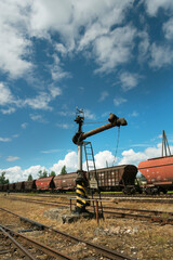 Old wagons and vintage water pump on the station.