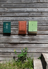 Mailboxes on the wall.