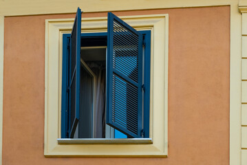 Open window shutters on a mediterranean house