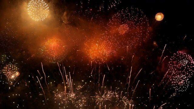 Background with colorful fireworks particle light looped