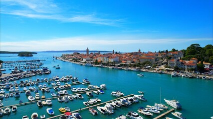 Rab - Croatia - An aerial view with the drone over the beautiful town of Rab - The drone rises...
