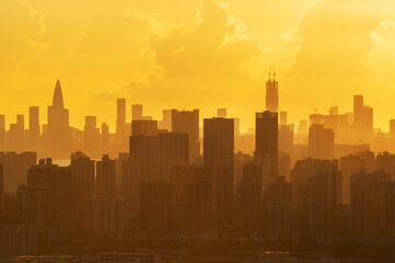 Silhouette of skyline of Shenzhen city, China under sunset. Viewed from Hong Kong border