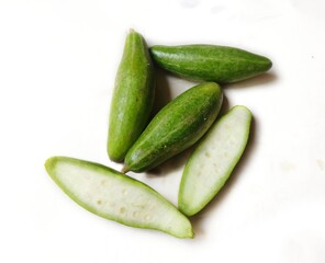 Pointed gourd is a vegetable with its origin in the Indian subcontinent. It is also known as parwal, palwal, potol, or parmalin in India and Bangladesh. Scientific name - Trichosanthes dioica. 
