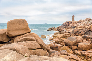 View at the Lighthouse of Red rocks(Phare de Men Ruz)at Atlantic seafront in Brittany - France