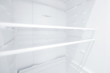 An empty refrigerator. Inside an empty, clean refrigerator, a refrigerator compartment after...