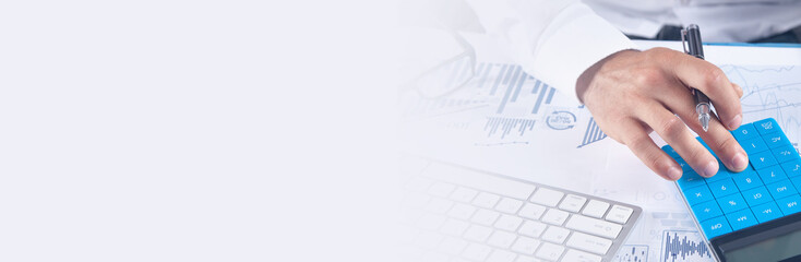 Businessman using calculator for analysis marketing plan. Business, Accounting