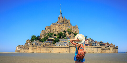 Traveler woman in Europa- Mont Saint Michel in France