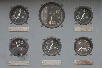 Close-up old control panel of factory machine. Vintage Industrial technology.