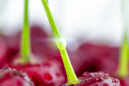 Fresh red cherry, food background.