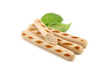 Grilled white chicken sausages, isolated on white background.
