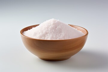 Fototapeta na wymiar Close up of salt on bowl isolated white background