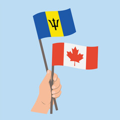 Flags of Barbados and Canada, Hand Holding flags