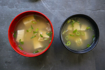 miso soup or Japanese miso soup in bowl on the table. Japanese cuisine in the form of soup with...