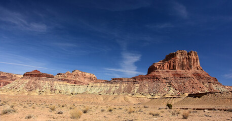 Fototapeta premium colorful red rock formations and assembly hall peak on a sunny winter day along the buckhorn draw scenic backway in the northern san rafael swell near green river, utah 