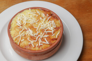 Traditional greek moussaka prepared in clay pot