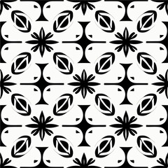 Leaves gracefully decorate a black and white fabric like pattern, repeating in an art deco inspired design that exudes a sense of elegance and peppermint motif flair.